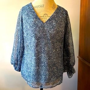 Women’s small lined blue floral print blouse, sheer long sleeves w/ elastic cuff